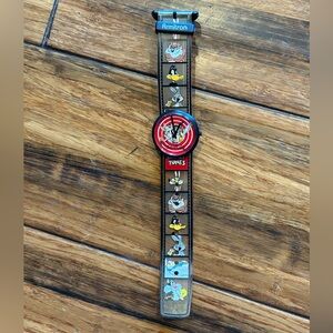 Vintage Armitron Looney Toons watch. Plastic band w/slide on face. Needs battery